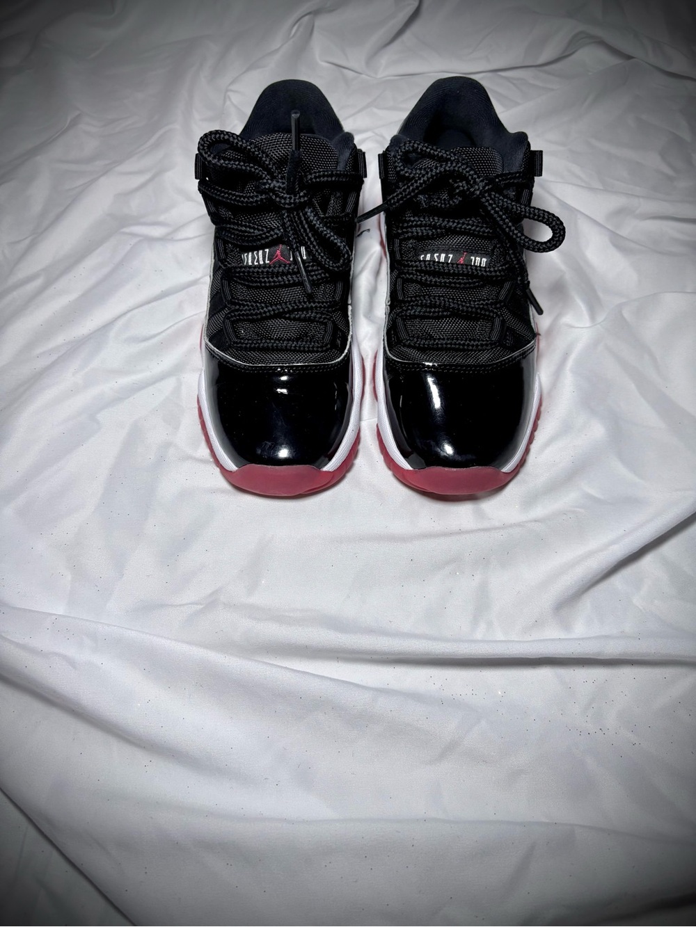 Air Jordan 11 Retro Low Bred Black Red White Sneakers